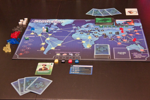 A two-player game of Pandemic all set up to play.
